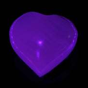 Mangano Calcite hand-carved heart 40-49g in UV light - Rocks and Things Store