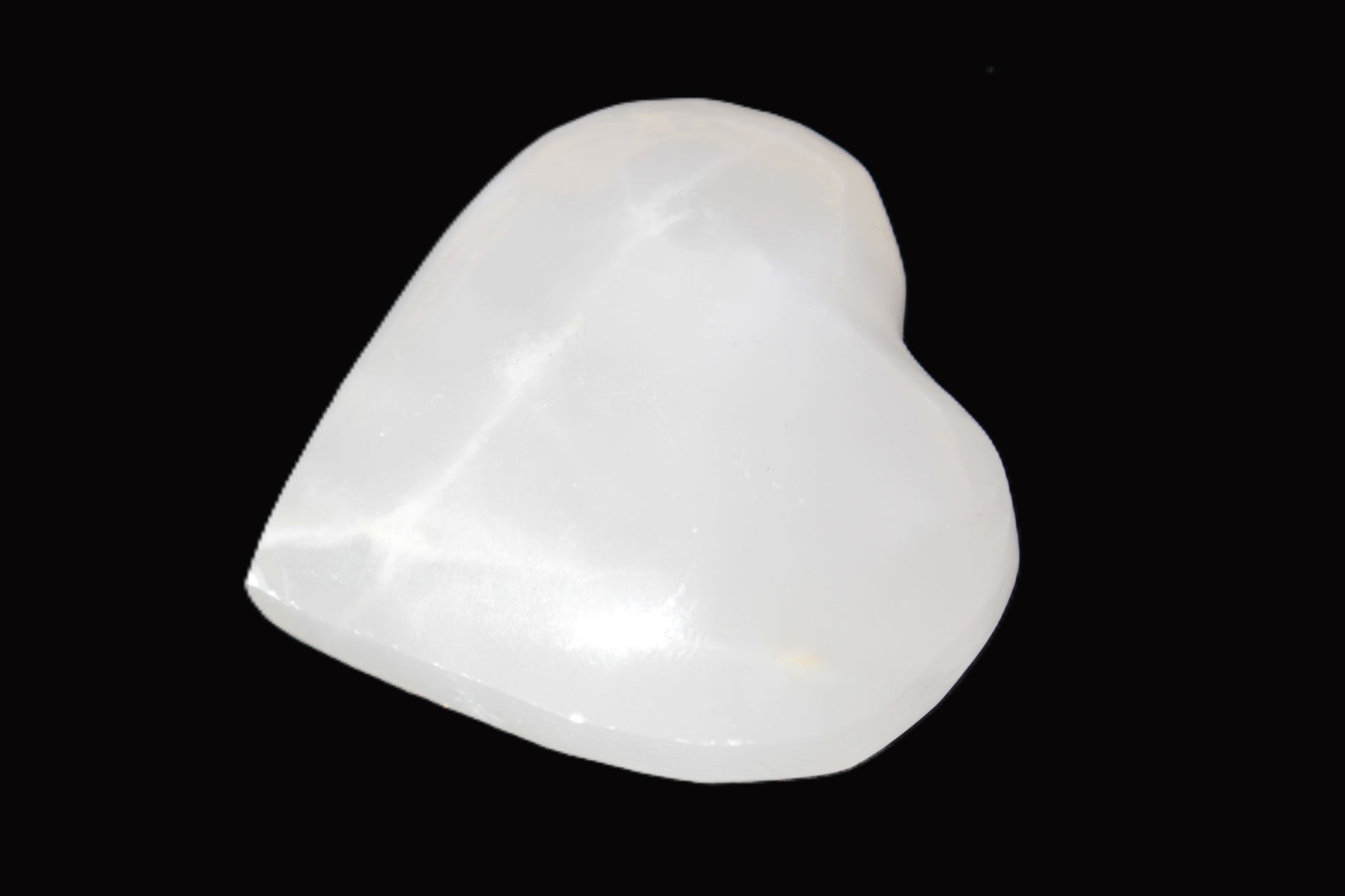 Mangano Calcite hand-carved heart 40-49g Rocks and Things