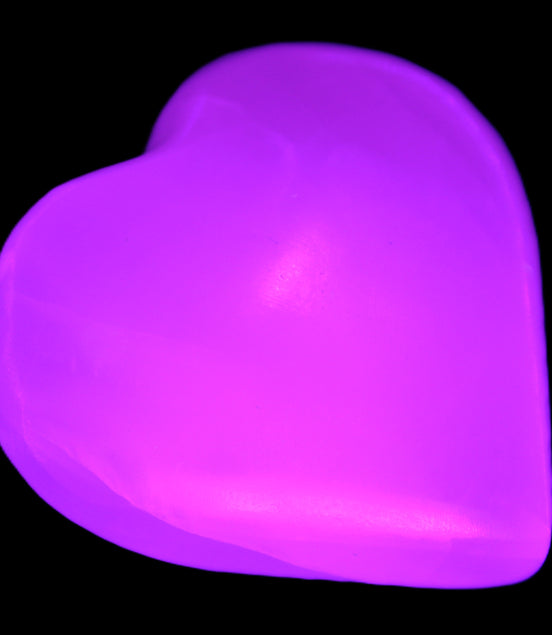 Pink Mangano Calcite 42-45mm in UV light