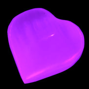 Pink Mangano Calcite 42-45mm in UV light