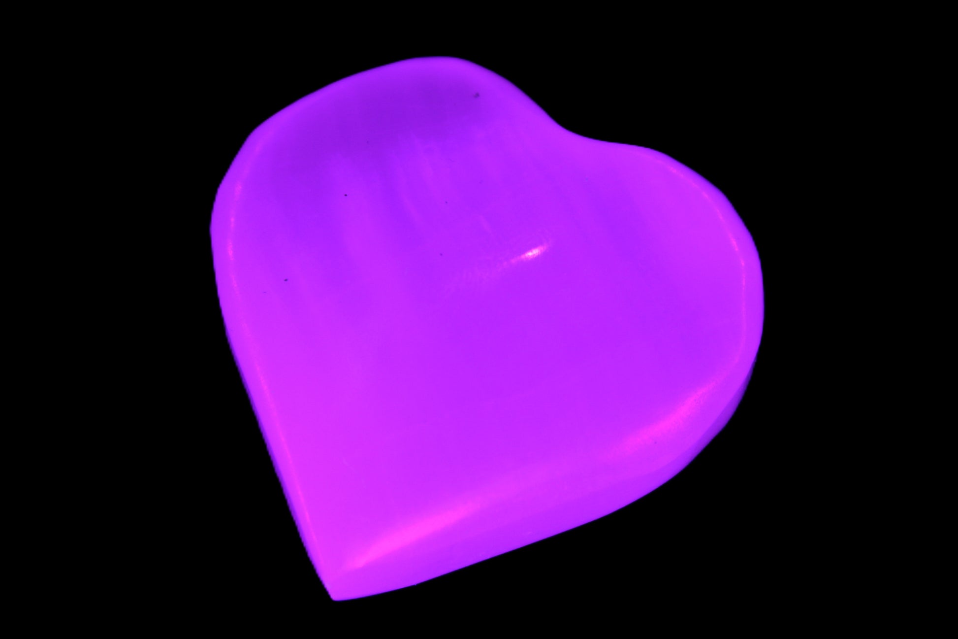 Pink Mangano Calcite 42-45mm in UV light