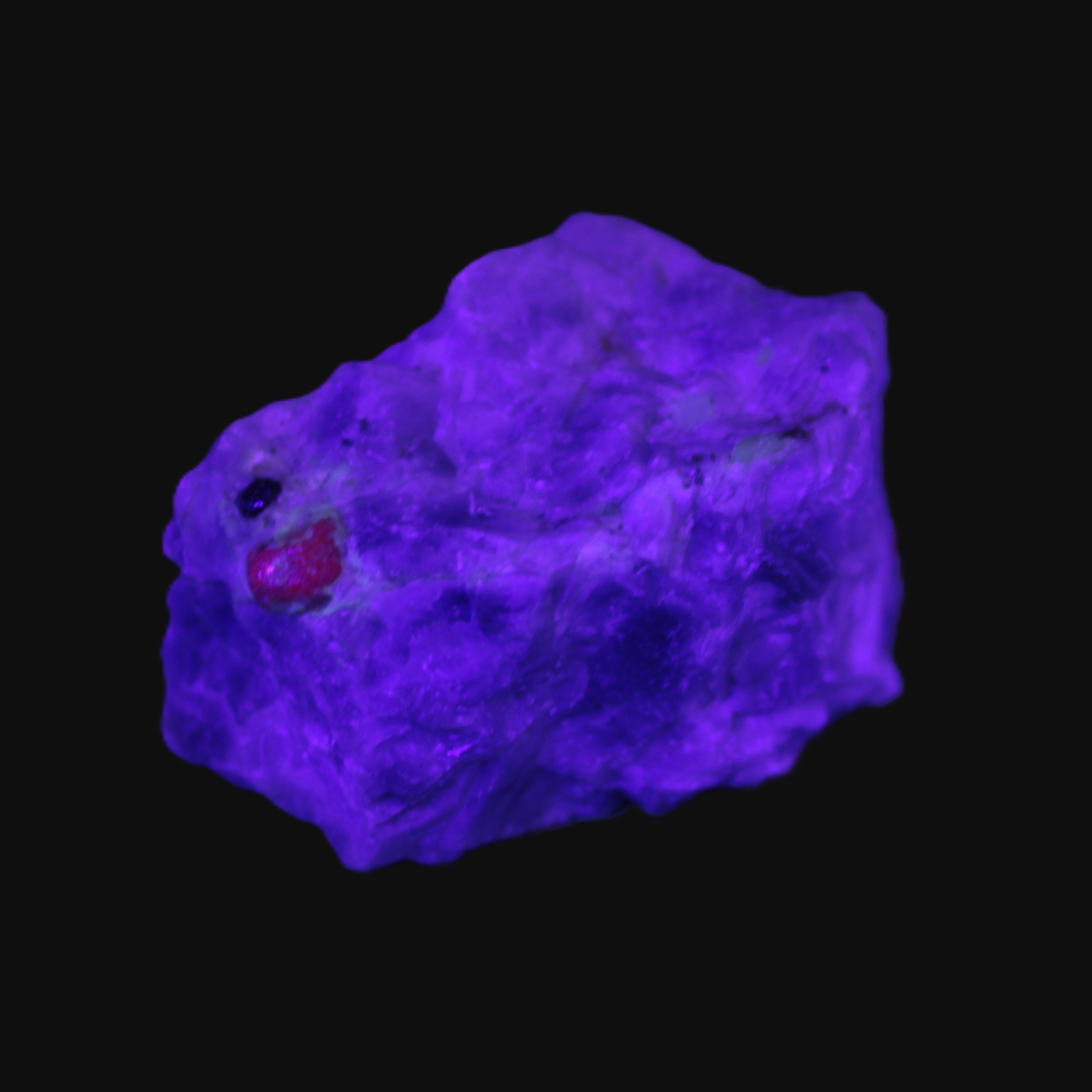 Ruby UV reactive with Muscovite in Marble 343ct 68.6g in UV light - Rocks and Things Store