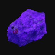 Ruby UV reactive with Muscovite in Marble 343ct 68.6g in UV light - Rocks and Things Store