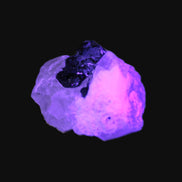 Rare Blue Tourmaline patina over Black Tourmaline in UV light