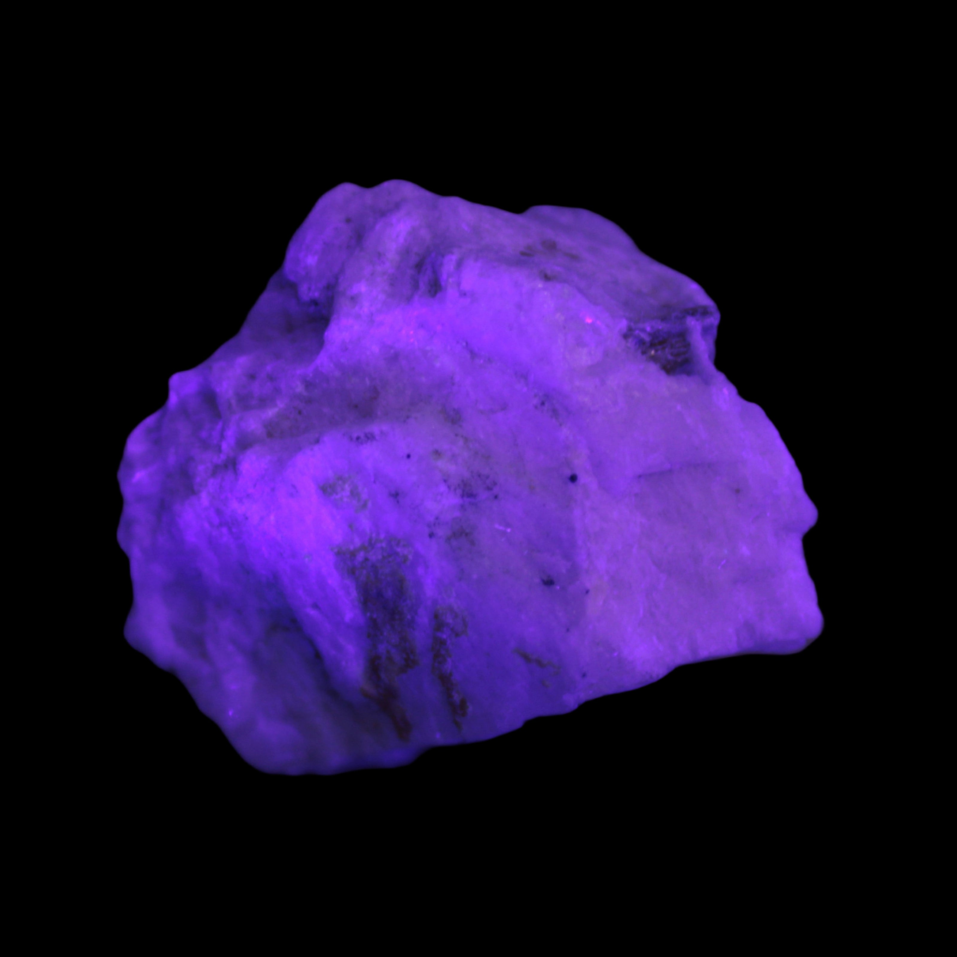 Aquamarine with three Micas in Feldspar matrix 311ct 62.3g in UV light - Rocks and Things Store