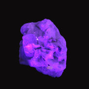 Aquamarine with three Micas in Feldspar matrix 311ct 62.3g in UV light - Rocks and Things Store