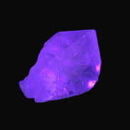 Clear Quartz crystal with phantoms and Elbaite 50mm 172.2ct 34.4g in UV light - Rocks and Things Store