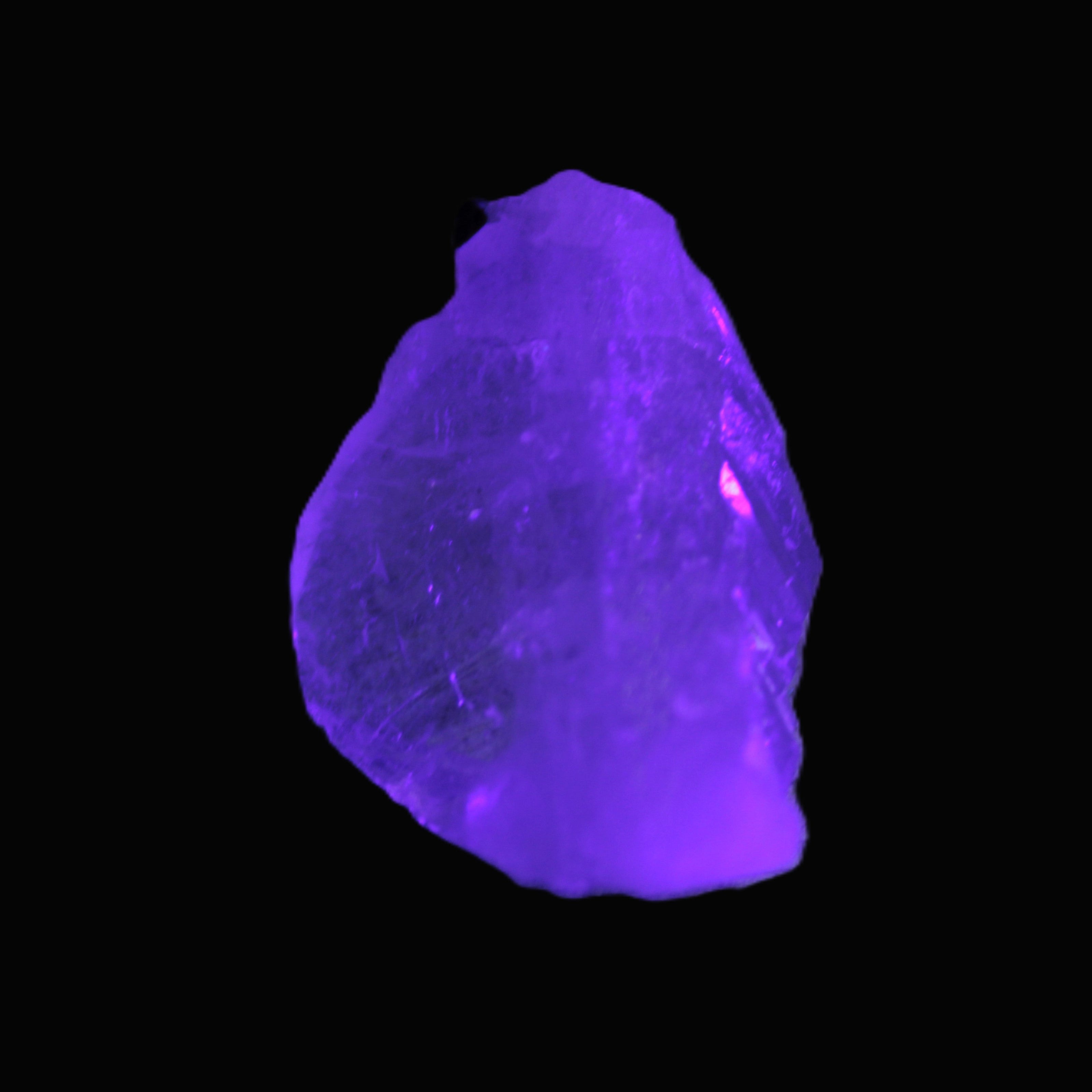 Clear Quartz crystal with phantoms and Elbaite 50mm 172.2ct 34.4g in UV light - Rocks and Things Store