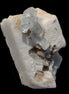 Rutile Aquamarine cluster on Feldspar matrix 28mm 93.6ct 18.7g in sunshine - Rocks and Things Store