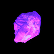 Multi-coloured Green Tourmaline crystal 43.4ct 8.7g in UV light