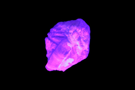 Multi-coloured Green Tourmaline crystal 43.4ct 8.7g in UV light