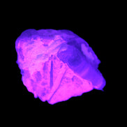 Multi-coloured Green Tourmaline crystal 43.4ct 8.7g in UV light