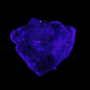 Clear Topaz crystals on matrix from Pakistan 98ct 19.5g in UV light - Rocks and Things Store