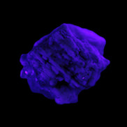 Clear Topaz crystals on matrix from Pakistan 98ct 19.5g in UV light - Rocks and Things Store