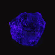 Clear Topaz crystals on matrix from Pakistan 98ct 19.5g in UV light - Rocks and Things Store