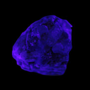 Clear Topaz crystals on matrix from Pakistan 98ct 19.5g in UV light - Rocks and Things Store