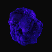 Clear Topaz crystals on matrix from Pakistan 98ct 19.5g in UV light - Rocks and Things Store