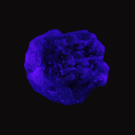 Clear Topaz crystals on matrix from Pakistan 98ct 19.5g in UV light - Rocks and Things Store