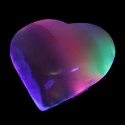 Heart hand-carved in dyed Calcite from Pakistan 72*68*16mm 126.6g in UV light - Rocks and Things Store