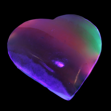 Heart hand-carved in dyed Calcite from Pakistan 72*68*16mm 126.6g in UV light - Rocks and Things Store