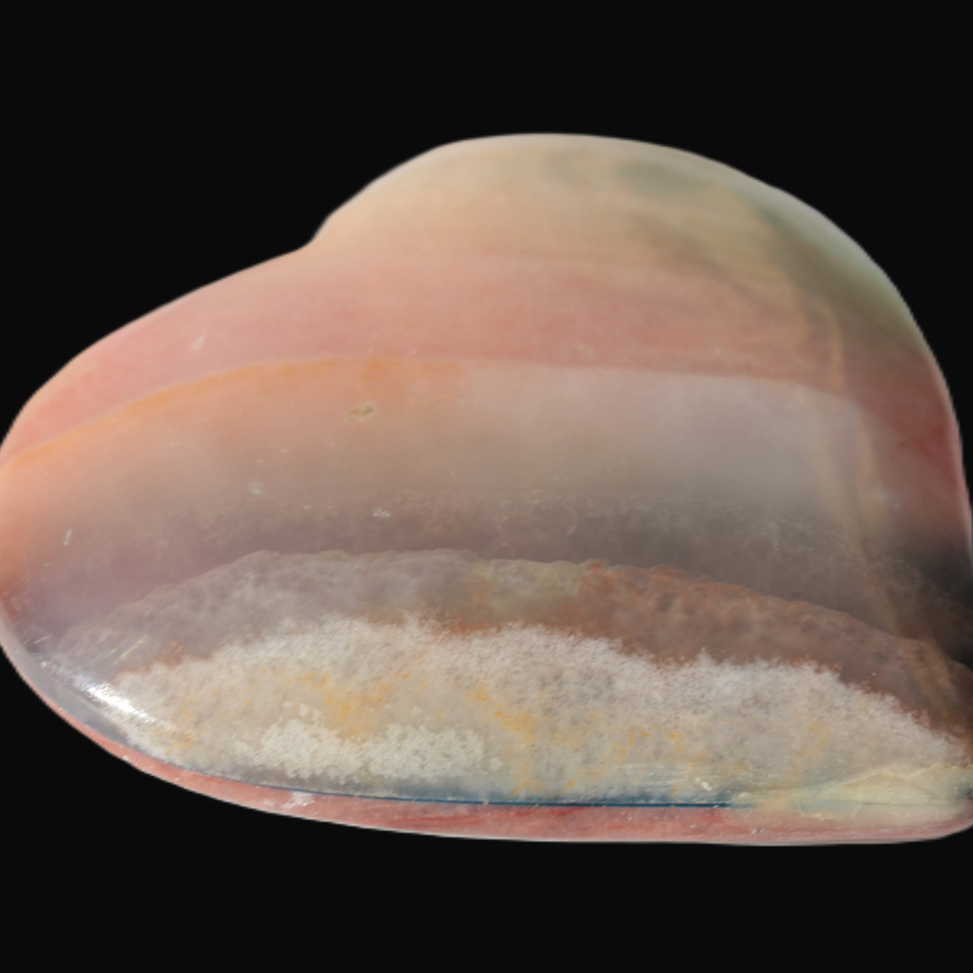 Heart hand-carved in dyed Calcite from Pakistan 72*68*16mm 126.6g in sunlight - Rocks and Things Store