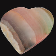 Heart hand-carved in dyed Calcite from Pakistan 72*68*16mm 126.6g in sunlight - Rocks and Things Store