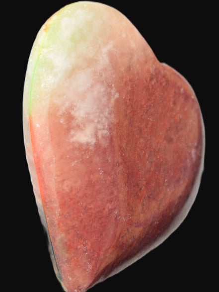 Heart hand-carved in dyed Calcite from Pakistan 72*68*16mm 126.6g in sunlight - Rocks and Things Store