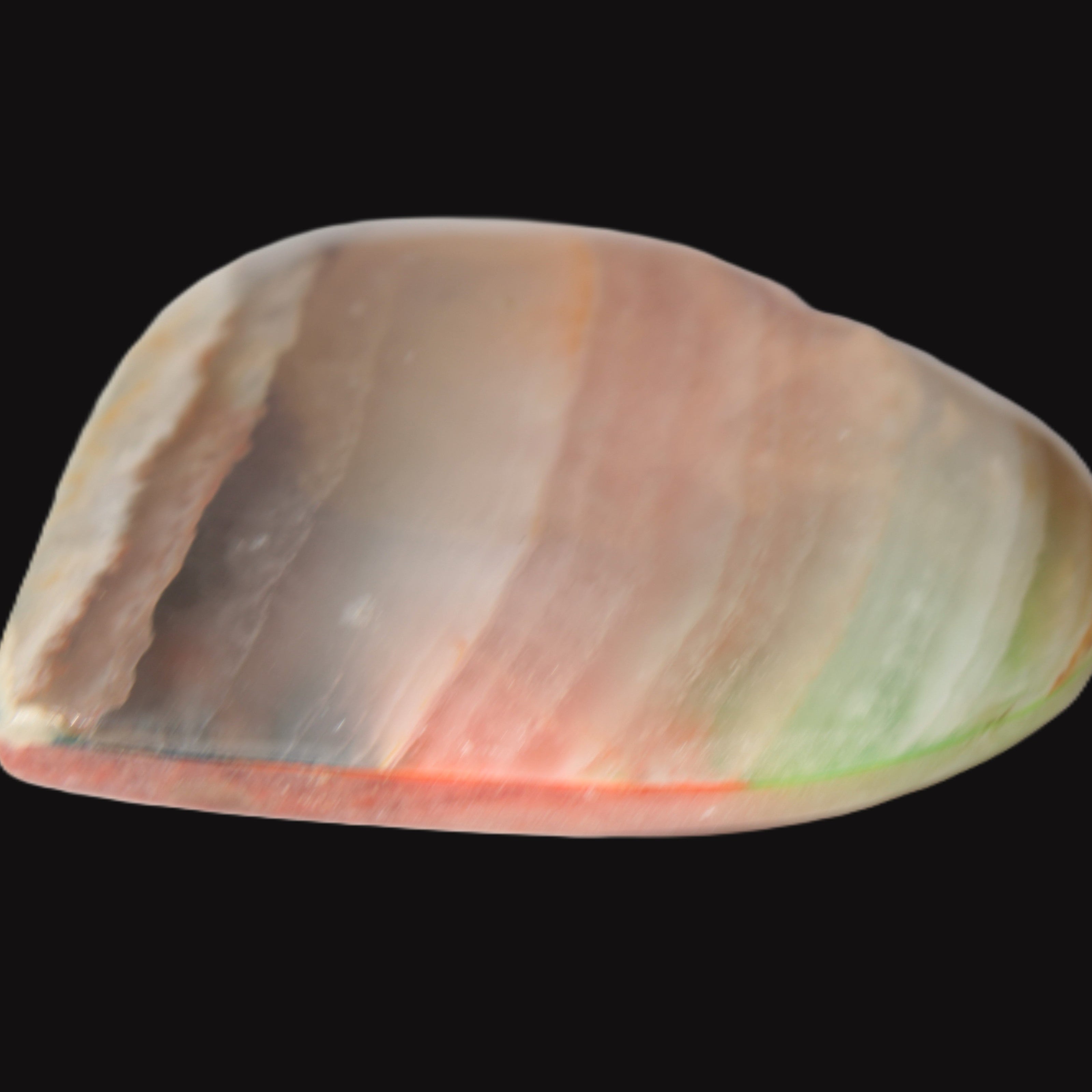 Heart hand-carved in dyed Calcite from Pakistan 72*68*16mm 126.6g in sunlight - Rocks and Things Store
