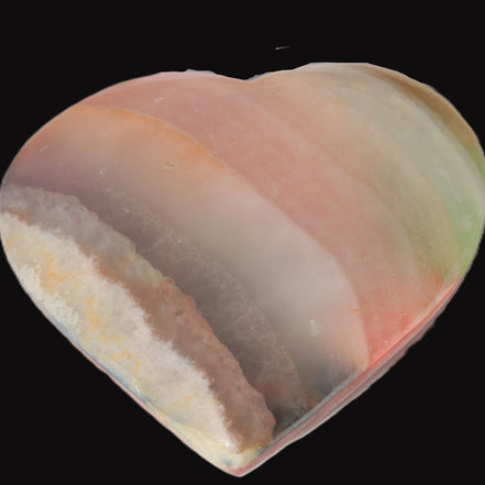Heart hand-carved in dyed Calcite from Pakistan 72*68*16mm 126.6g in sunlight - Rocks and Things Store
