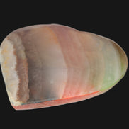 Heart hand-carved in dyed Calcite from Pakistan 72*68*16mm 126.6g in sunlight - Rocks and Things Store