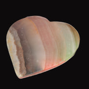 Heart hand-carved in dyed Calcite from Pakistan 72*68*16mm 126.6g in sunlight - Rocks and Things Store