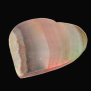 Heart hand-carved in dyed Calcite from Pakistan 72*68*16mm 126.6g in sunlight - Rocks and Things Store