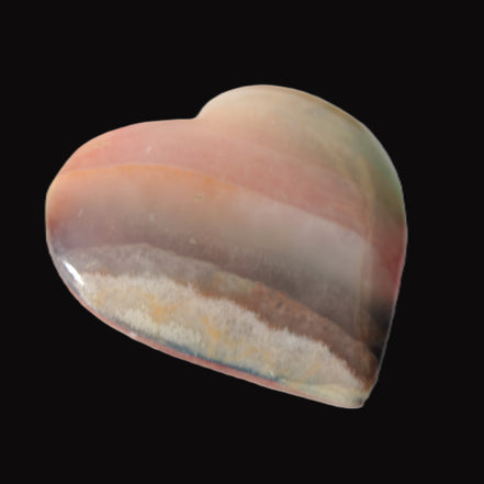 Heart hand-carved in dyed Calcite from Pakistan 72*68*16mm 126.6g in sunlight - Rocks and Things Store