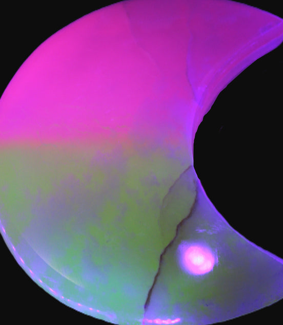 Pink and Yellow dyed Calcite crescent moon 90*100*14mm 201g in UV light - Rocks and Things Store