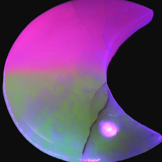 Pink and Yellow dyed Calcite crescent moon 90*100*14mm 201g in UV light - Rocks and Things Store