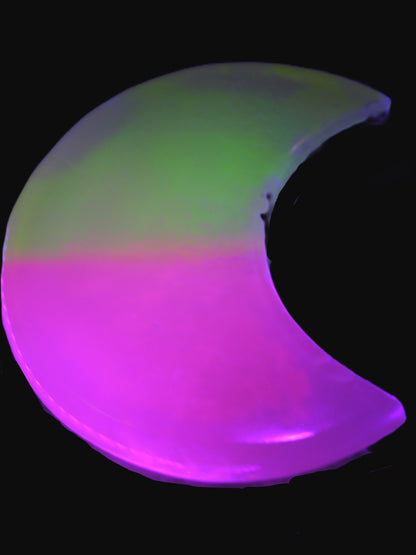 Calcite Pink and Yellow dyed crescent moon in UV light