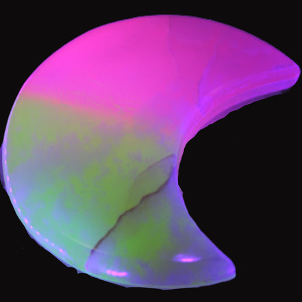 Pink and Yellow dyed Calcite crescent moon 90*100*14mm 201g in UV light - Rocks and Things Store