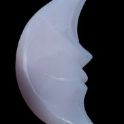 Mangano Calcite smiling Crescent Moon 70*132.22mm 331g in sunlight  - Rocks and Things Store