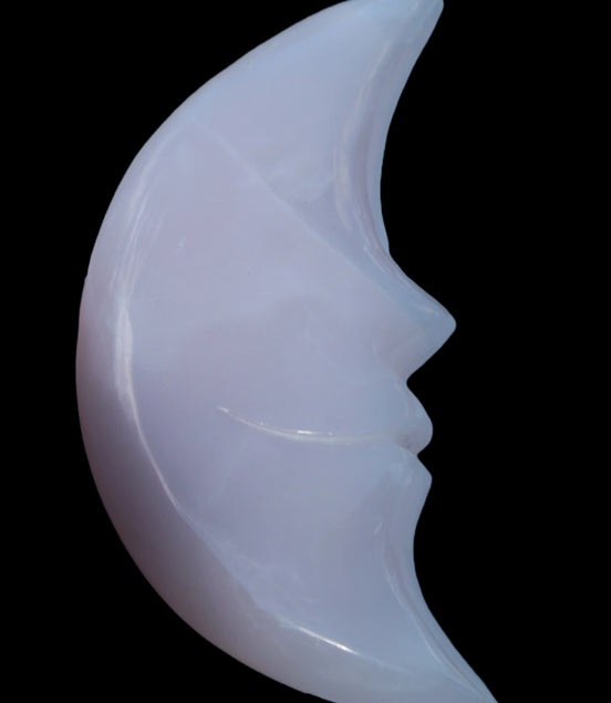 Mangano Calcite smiling Crescent Moon 70*132.22mm 331g in sunlight  - Rocks and Things Store