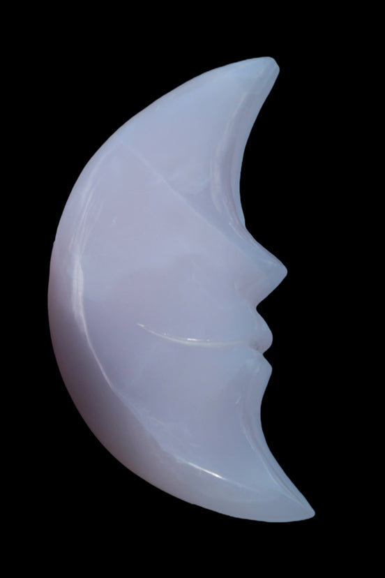 Mangano Calcite smiling Crescent Moon 70*132.22mm 331g in sunlight  - Rocks and Things Store