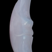 Mangano Calcite smiling Crescent Moon 70*132.22mm 331g in sunlight  - Rocks and Things Store