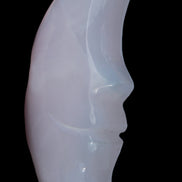 Mangano Calcite smiling Crescent Moon 70*132.22mm 331g in sunlight  - Rocks and Things Store