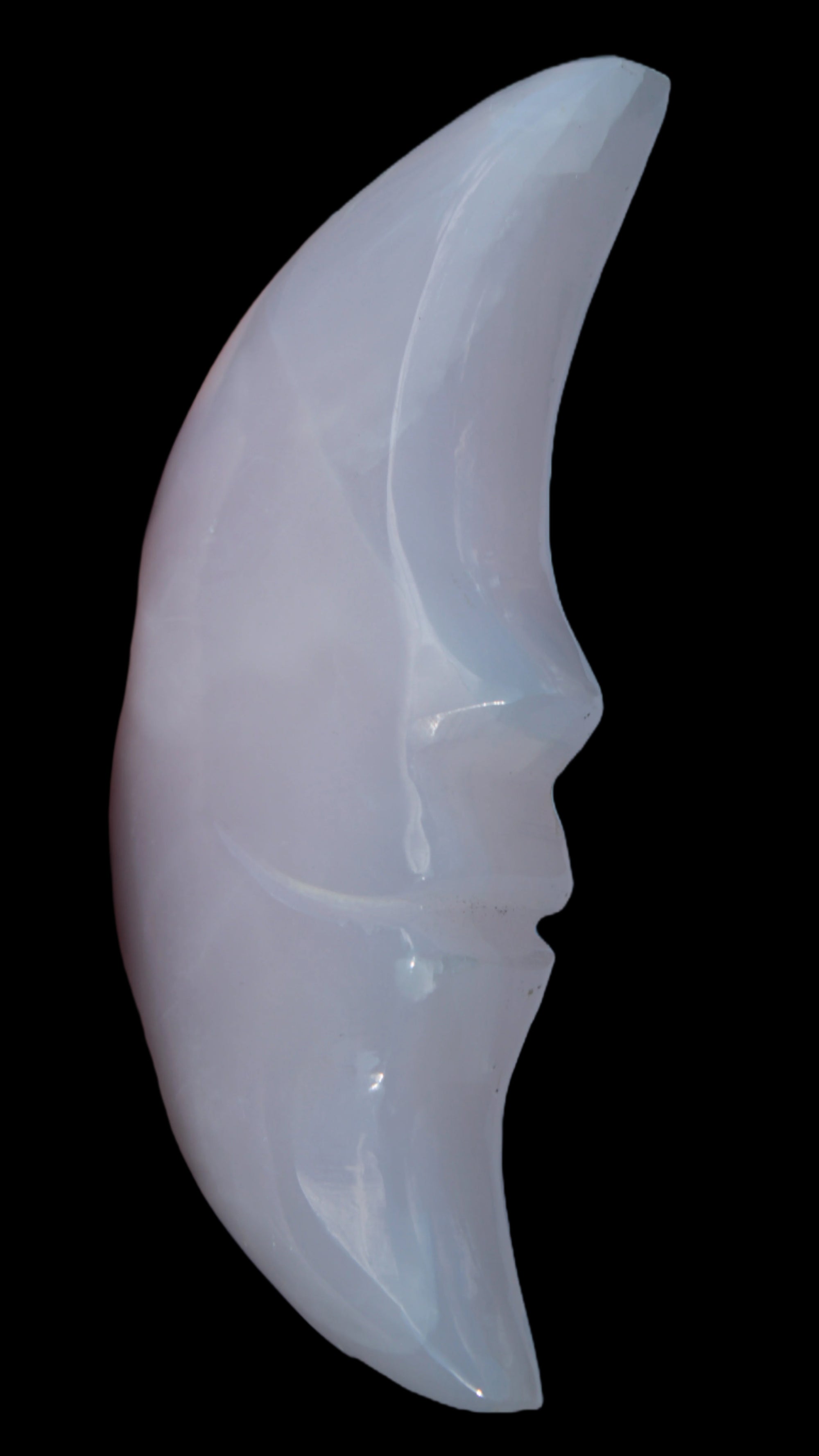 Mangano Calcite smiling Crescent Moon 70*132.22mm 331g in sunlight  - Rocks and Things Store