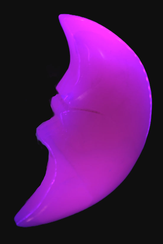 Mangano Calcite smiling Crescent Moon 70*132.22mm 331g in UV light  - Rocks and Things Store