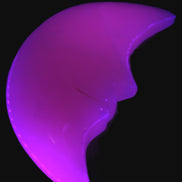 Mangano Calcite smiling Crescent Moon 70*132.22mm 331g in UV light  - Rocks and Things Store