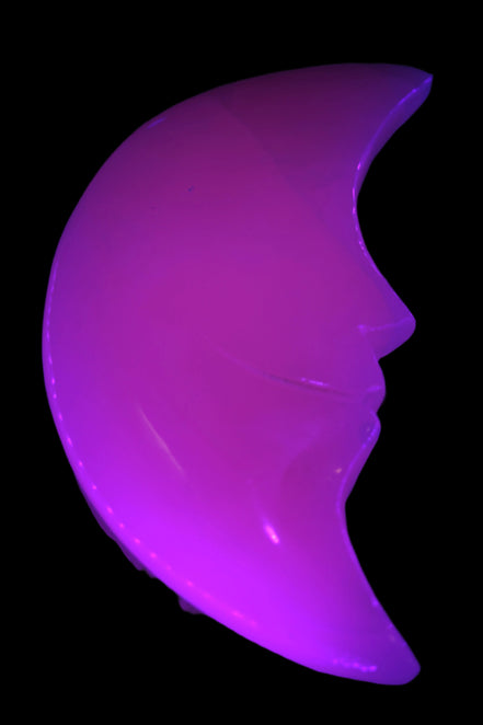 Mangano Calcite smiling Crescent Moon 70*132.22mm 331g in UV light  - Rocks and Things Store