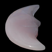 Mangano Calcite smiling Crescent Moon 70*132.22mm 331g in sunlight  - Rocks and Things Store