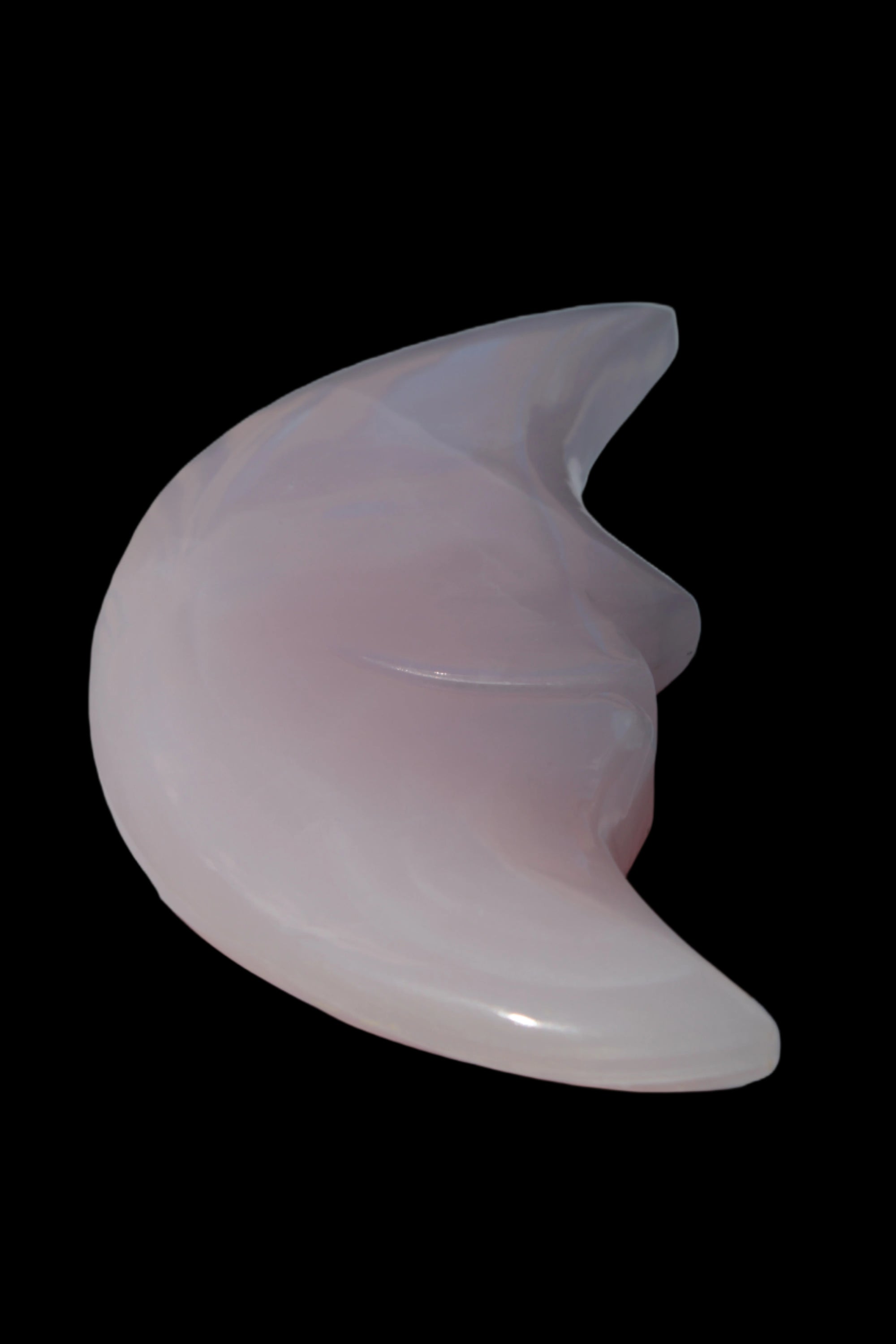 Mangano Calcite smiling Crescent Moon 70*132.22mm 331g in sunlight  - Rocks and Things Store