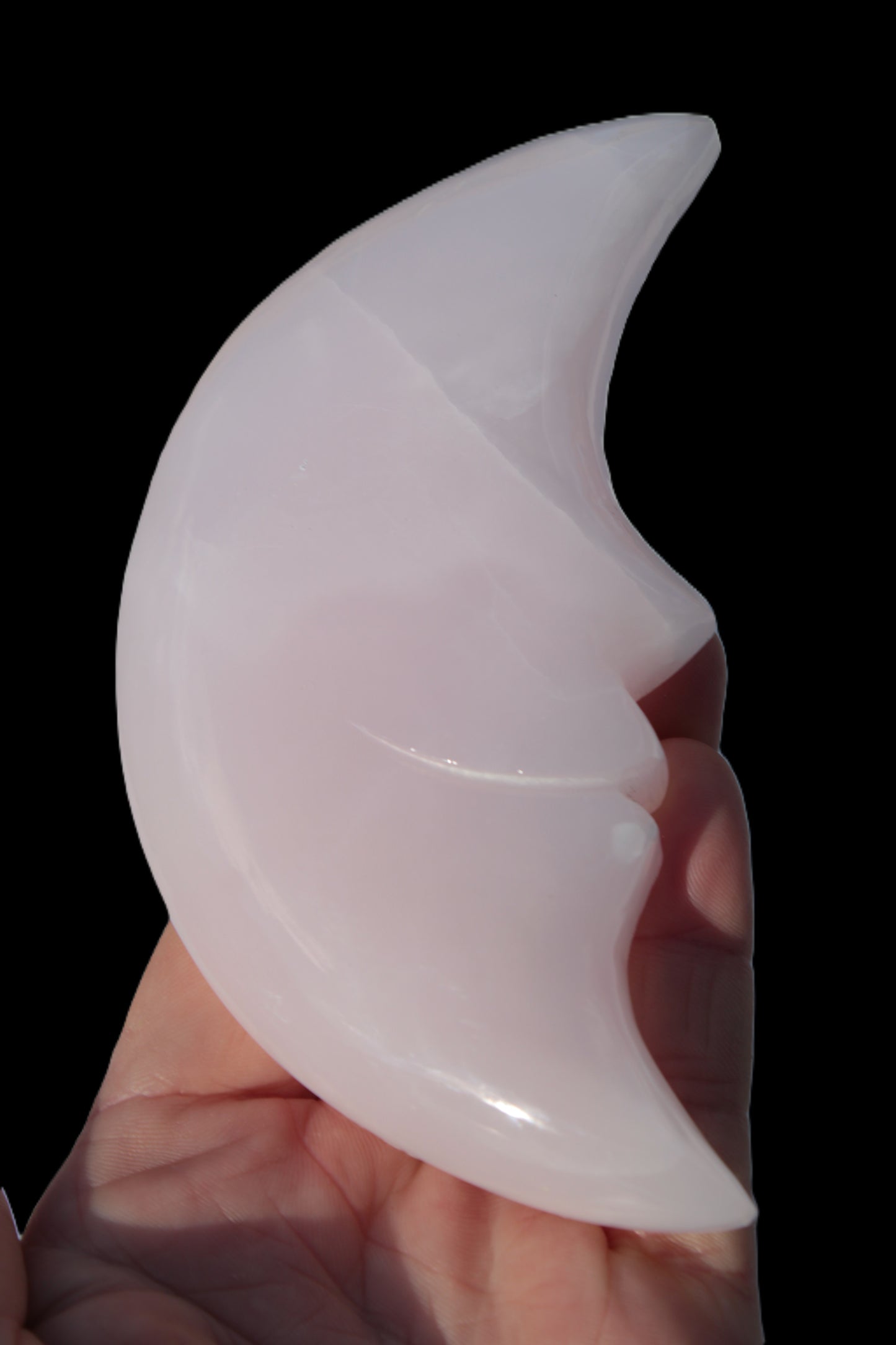 Mangano Calcite smiling Crescent Moon 70*132.22mm 331g Rocks and Things