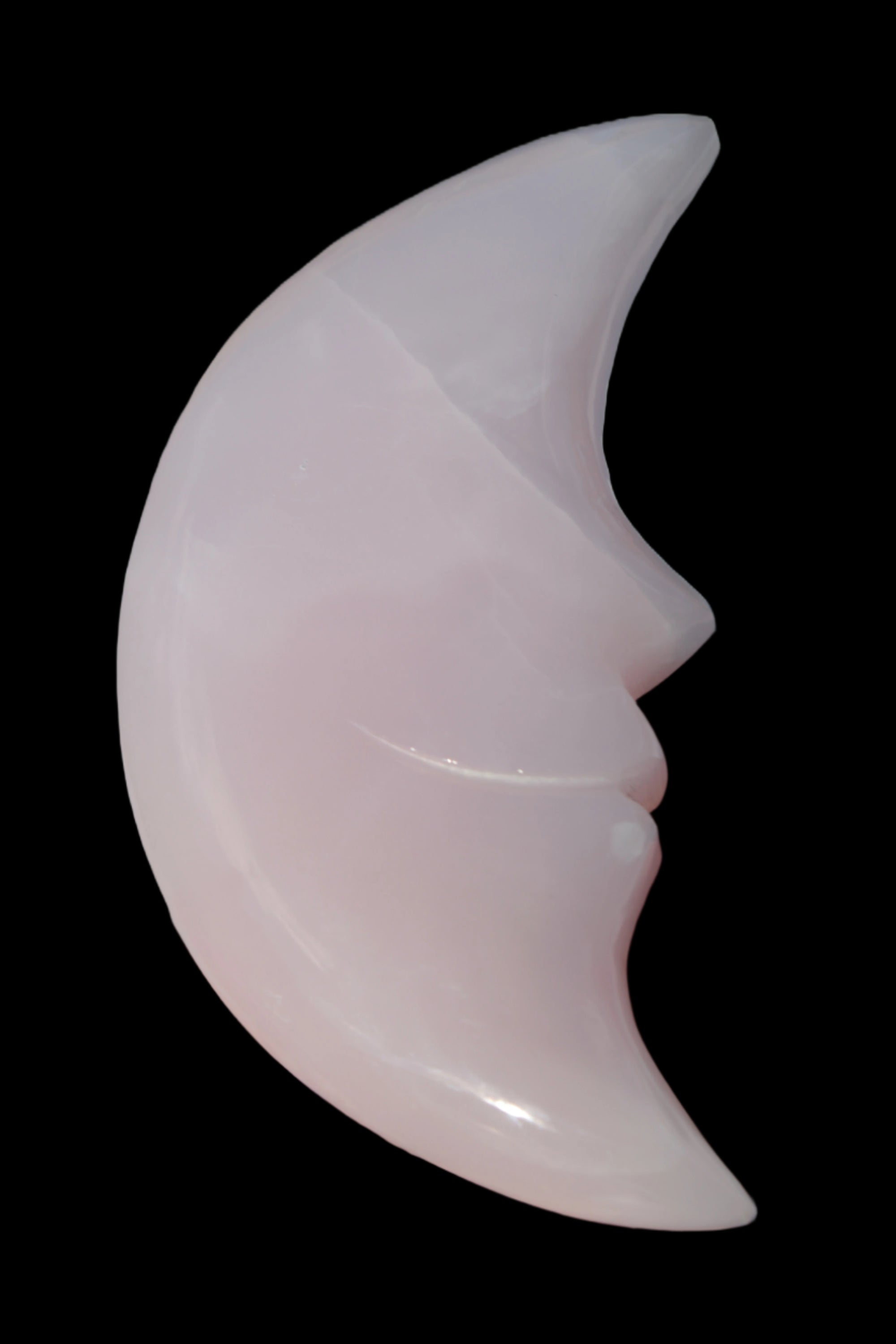 Mangano Calcite smiling Crescent Moon 70*132.22mm 331g in sunlight  - Rocks and Things Store